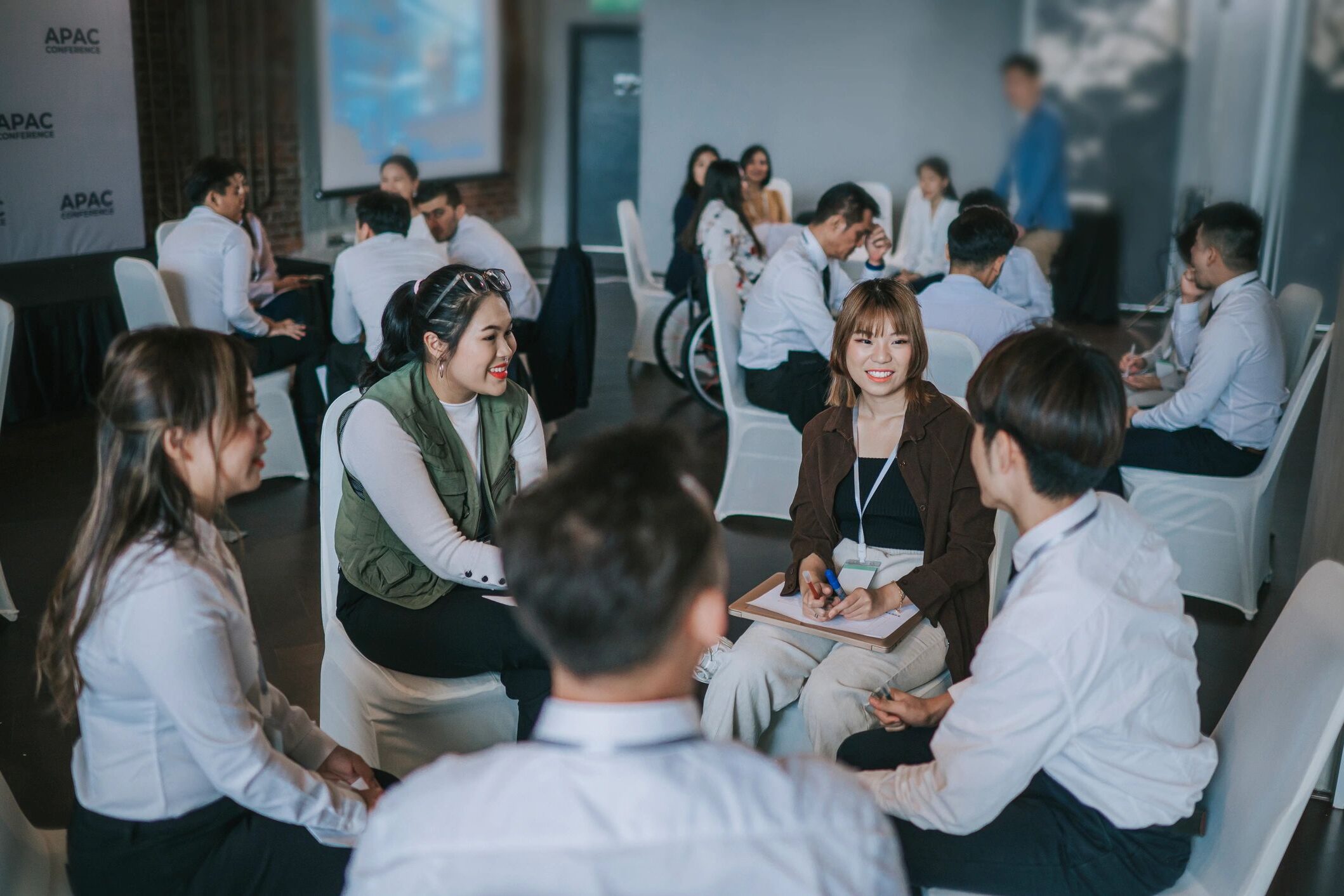 Group workshop discussion with participants collaborating